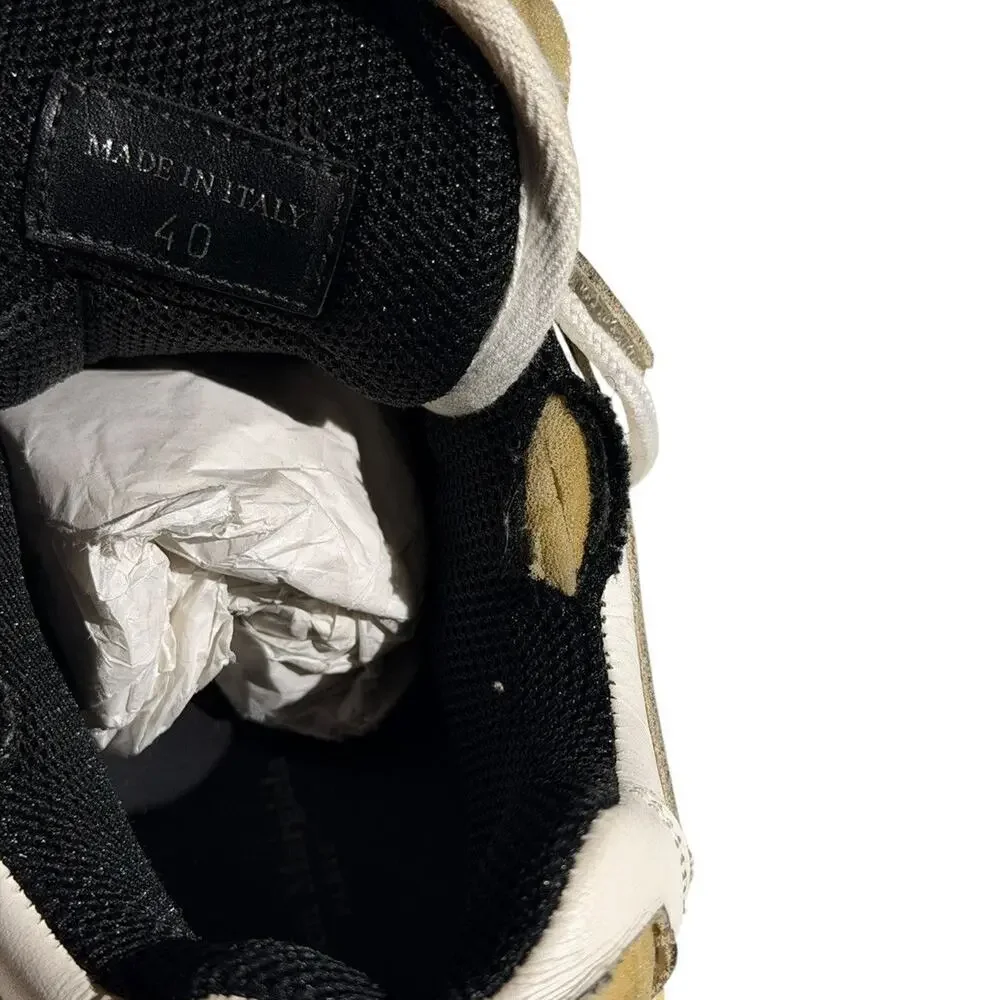 “Worn” look strap sneaker